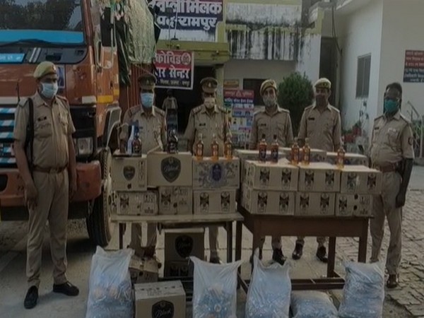 Seized liquor bottle boxes Photo/ANI