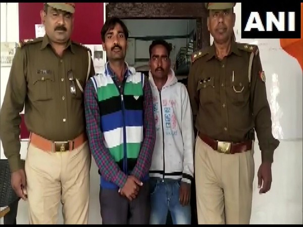 Visual of rape accused with police. 