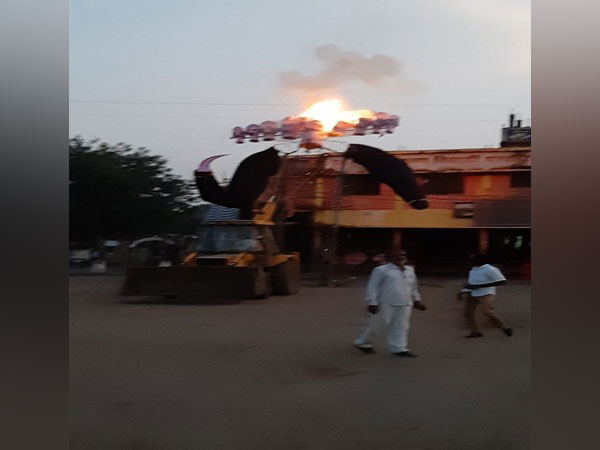 Ravana effigy in flames after colliding with overhead electric wire in Vidisha, Madhya Pradesh. (Photo/ANI)