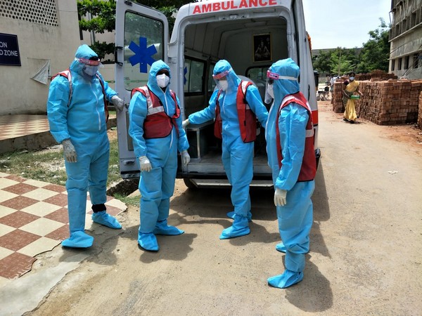 Red Cross volunteers performed final rites of a man who died due to COVID-19. (Photo/ANI)
