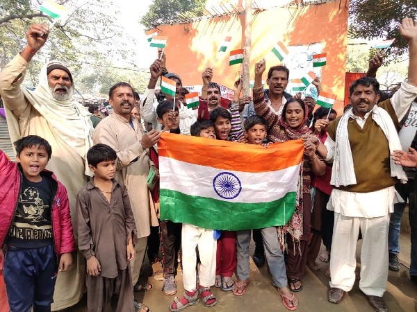 Pakistani Hindus celebrating in a settlement colony in Delhi on Wednesday. Photo/ANI
