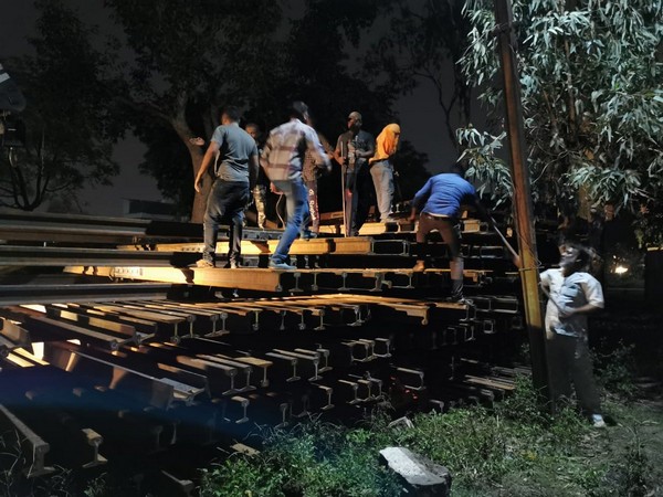 Visual of the rescue operation to save a dog and its puppies near Bhopal Railway Station on Saturday. Photo/ANI