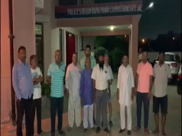Residents of Jalandhar's Rama Mandi outside police station