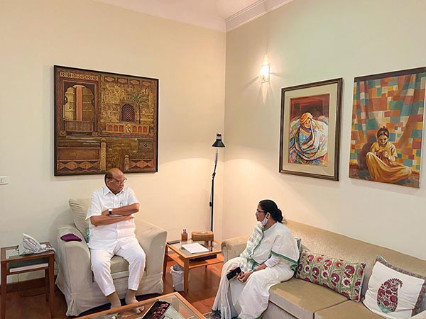 West Bengal Chief Minister Mamata Banerjee with Sharad Pawar at his residence.