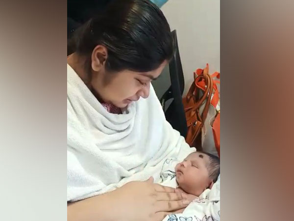 Dr Arfa Sajadin reunited with her child after 10 days.