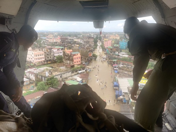 IAF dropping relief materials in flood-hit Assam. (ANI/photo)