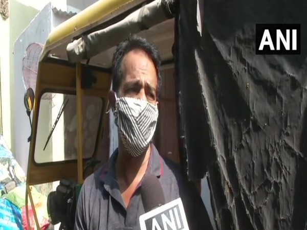 Manoj, e-rickshaw puller, speaking to ANI. Photo/ANI