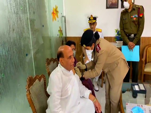 Union Home Minister Rajnath Singh taking his first COVID-19 vaccine shot on Tuesday.