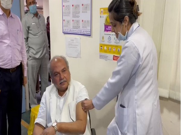 Union Minister Narendra Singh Tomar taking his first dose of the COVID19 vaccine.