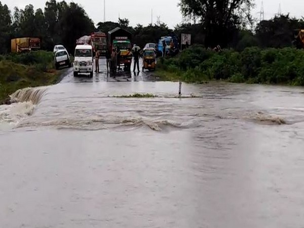 A temporary road was washed away in heavy rains in Guntur. [Photo/ANI]