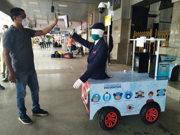 A robot ensuring thermal scanning at a Railway station in Mumbai.