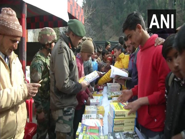 Rashtriya Rifle distributed competitive exam books among students in Poonch on Thursday 