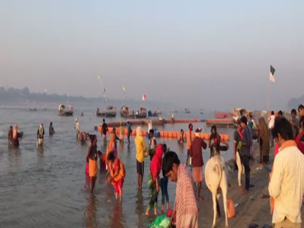 People take holy dip in Ganga in Varanasi. (Photo/ANI)
