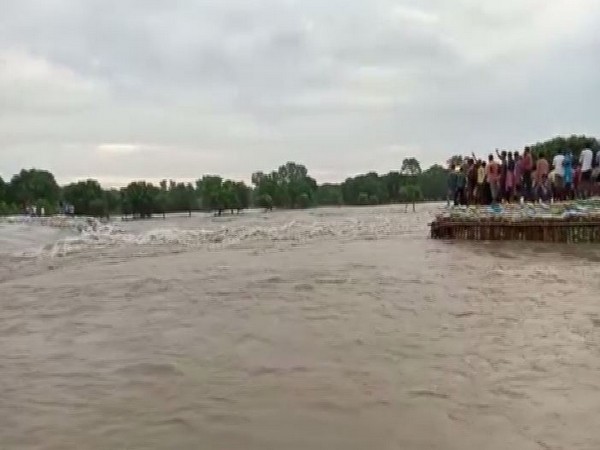 Due to a breakage of the temporary embankment on Fulahar river in Malda in West Bengal on Thursday. Photo/ANI