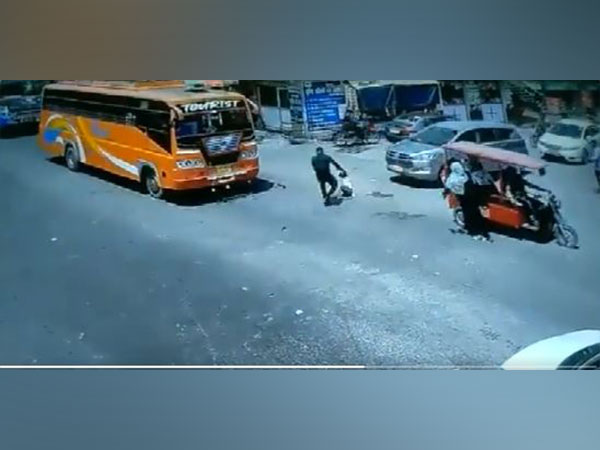 Visual of City Patrol Unit (CPU)personnel, Sundar Sharma saving the child (Photo/ANI)