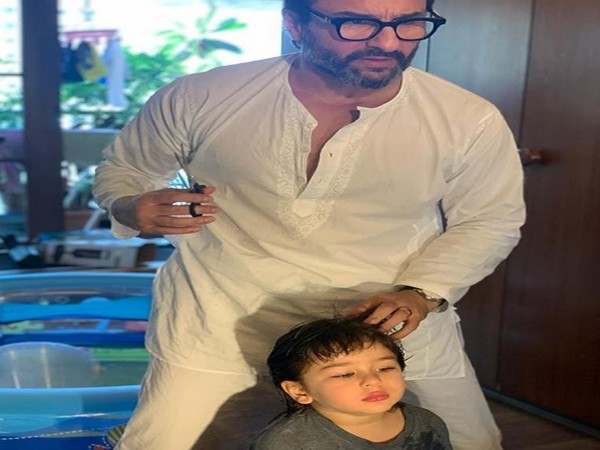 Actor Saif Ali Khan trimming son Taimur's hair (Image source: Instagram)