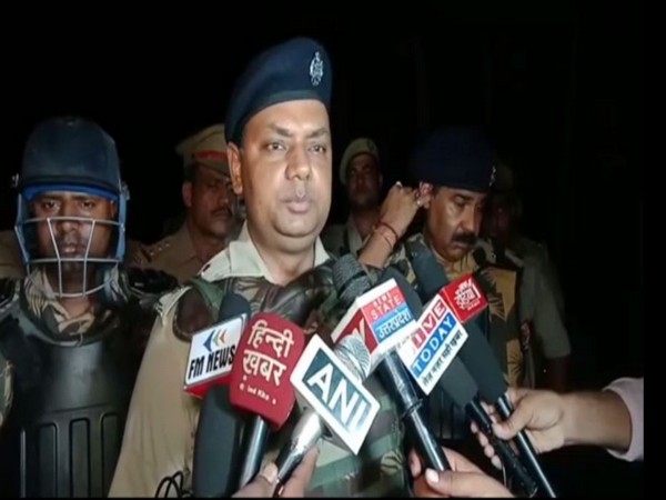 Superintendent of Police, Yamuna Prasad speaking to reporters in Sambal, Uttar Pradesh.