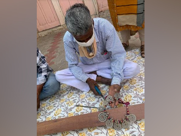 Sangeeta Boochra with Artisans in Indian Villages post COVID helping them