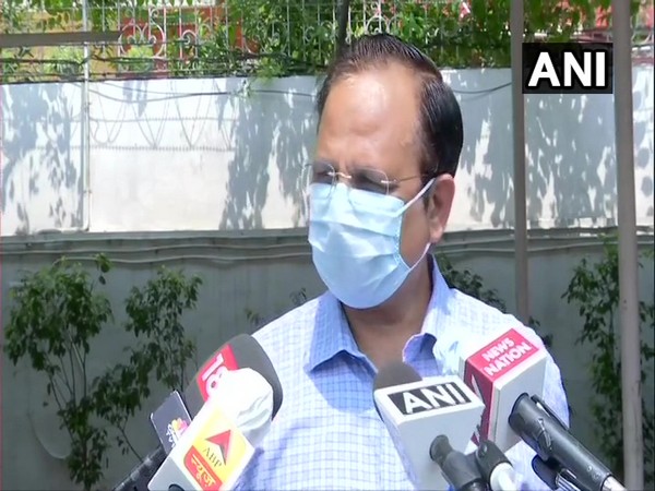 Health Minister Satyendar Jain speaking to reporters in New Delhi on Tuesday.