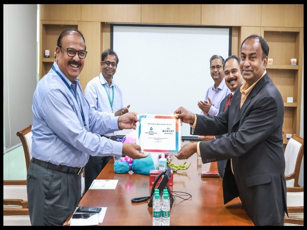 Visual of Dr K Anand Kumar, MD, IIL handing over the first lot of Covaxin drug substance to Dr Krishna Ella, CMD, Bharat Biotech (Photo/ANI)