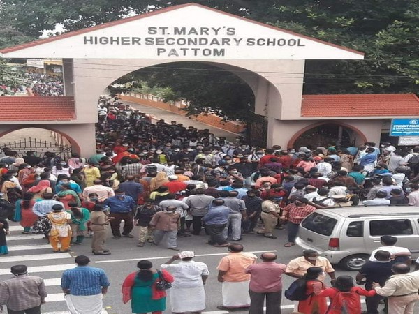 Students and their parents gathered out a KEAM centre in Pottam, Thiruvananthapuram. (Photo/ANI)