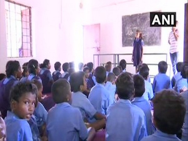 Students while attending a class in Jagargunda village. (Photo/ANI)