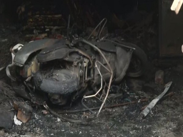 Some bikes parked outside the shop came in contact of the fire and wre completely gutted on Thursday morning. (Photo/ANI)