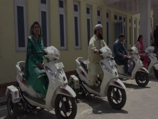 Beneficiaries on specially designed scooters in Doda, Jammu and Kashmir, on Sunday. (ANI/Photo)