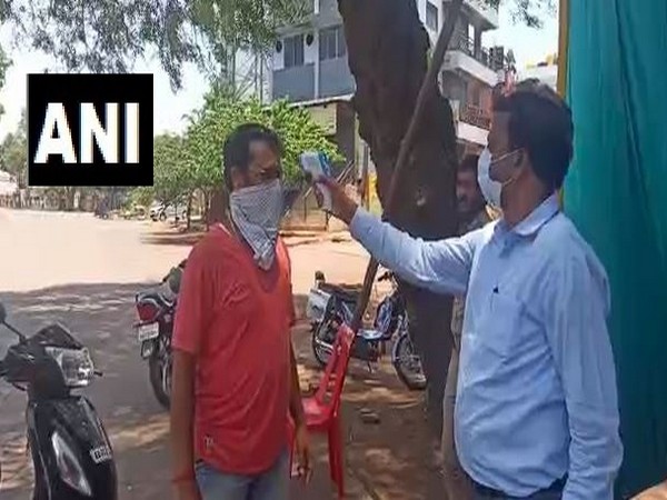 Medical team carrying out screening in Hubli, Karnataka on Saturday. 