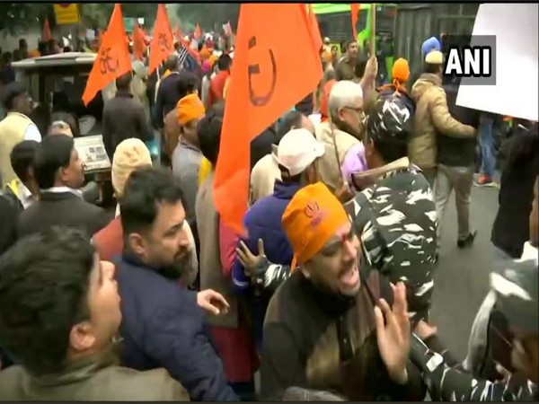 A scuffle broke out between Bajrang Dal, Durga Vahini workers and security forces in New Delhi on Tuesday