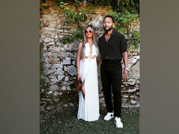 Chrissy Teigen with husband and singer John Legend (Image Source: Instagram)
