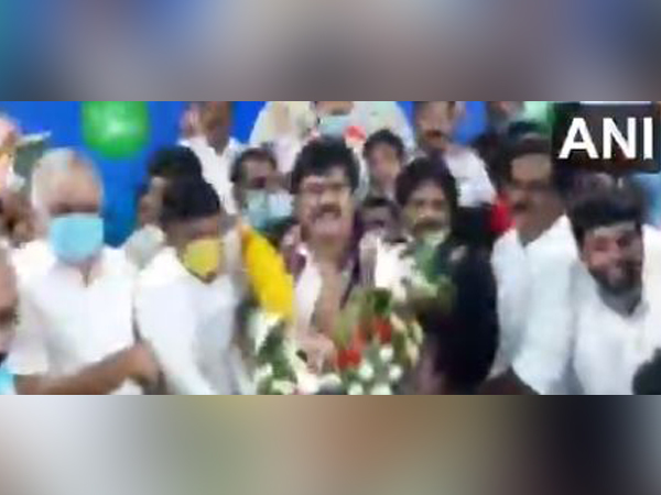    Andhra Pradesh Tourism Minister being offered garland in an event at party office in Visakhapatnam on Monday. Photo/ANI