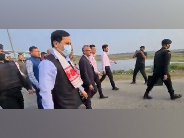 Union Minister of Ports, Shipping and Waterways Sarbananda Sonowal and others at the site. (Photo/ANI)