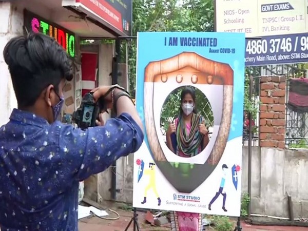 People getting themselves clicked after getting vaccinated against COVID-19. (Photo/ANI)