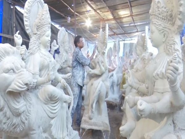 An artist making idols in Telangana's Hyderabad. (Photo/ANI)