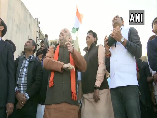 Amit Shah flew kite in Ahmedabad on Tuesday (Photo/ANI)
