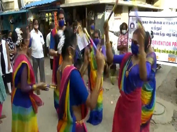 Members of the transgender community in Tamil Nadu's Chennai performed the Kolattam folk dance to raise awareness about COVID-19. 