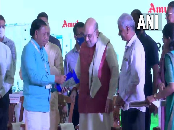 Union Home Minister Amit Shah inaugrates Amul's milk powder plant and automated storage in Gandhinagar (Photo/ ANI)