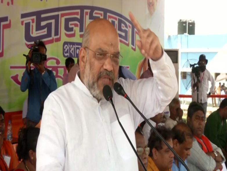 BJP president Amit Shah speaking at a rally in South 24 Parganas, West Bengal, on Monday. (Photo/ANI)