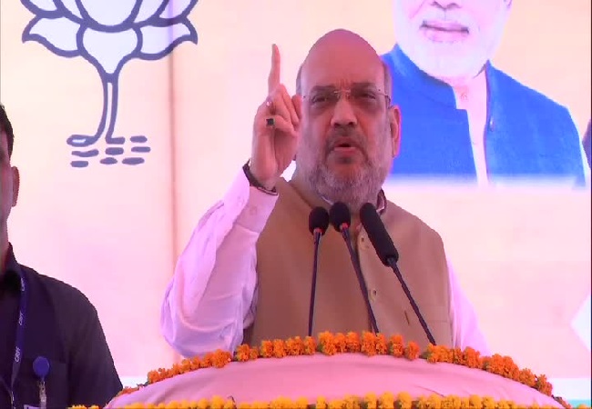 Union Home Minister Amit Shah speaking at an rally in Kaithal, Haryana on Wednesday.
