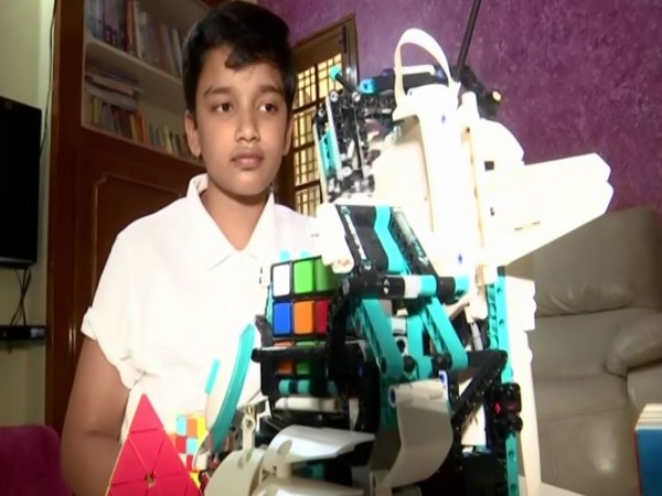11-year-old SP Shankar with his robot. (Photo/ANI)