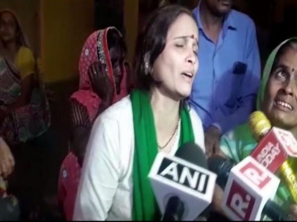 Kiran, wife of Hindu Samaj Party chief Kamlesh Tiwari speaking to reporters in Sitapur. 