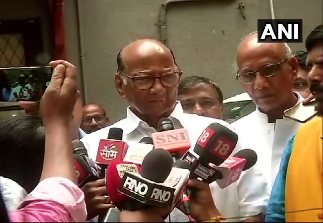 NCP chief Sharad Pawar speaking to media in Mumbai, Maharashtra on Friday.