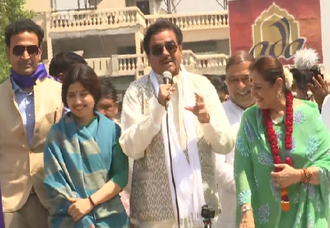 On left SP leader Dimple Yadav, in middle Congress leader Shatrughan Sinha and on right SP leader Poonam Sinha during a road show in Lucknow on Thursday Photo/ANI.