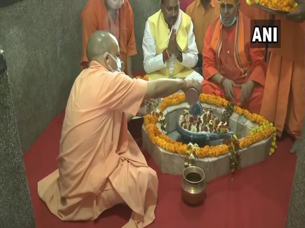 UP Chief Minister Yogi Adityanath offers prayers at Shiv temple in Bharohia of Gorakhpur district (Photo/ ANI)