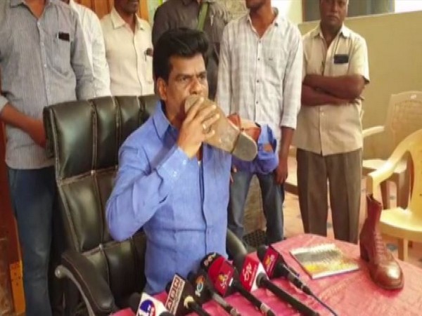 Hindupur MP Gorantla Madhav kisses police shoe at Anantapuram on Friday 