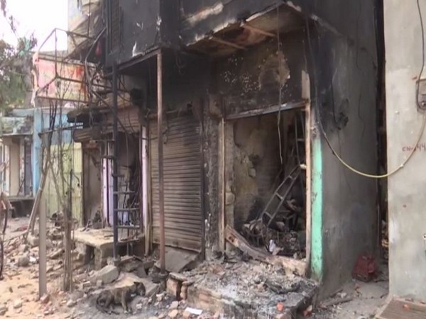 Shops at Shiv Vihar Chowk were vandalised during the violence in northeast Delhi. Photo/ANI