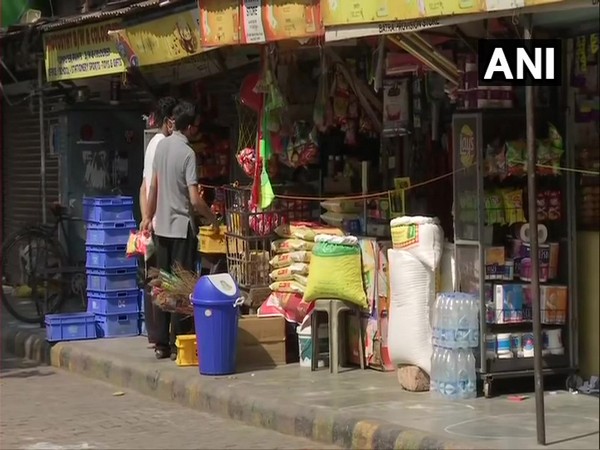 Shop selling essential commodities reopens in Bengali Market on Monday. Photo/ANI