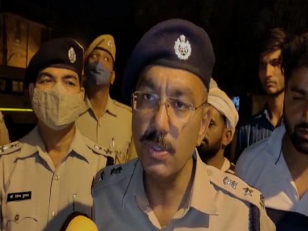 SP Manish Tripathy speaking to reporters.