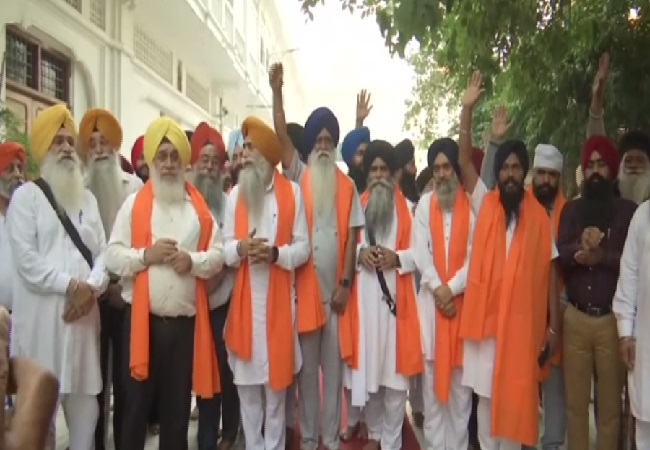 A Sikh procession in Amritsar leaving for Pakistan to celebrate 550 anniversary of Guru Nanak Dev.